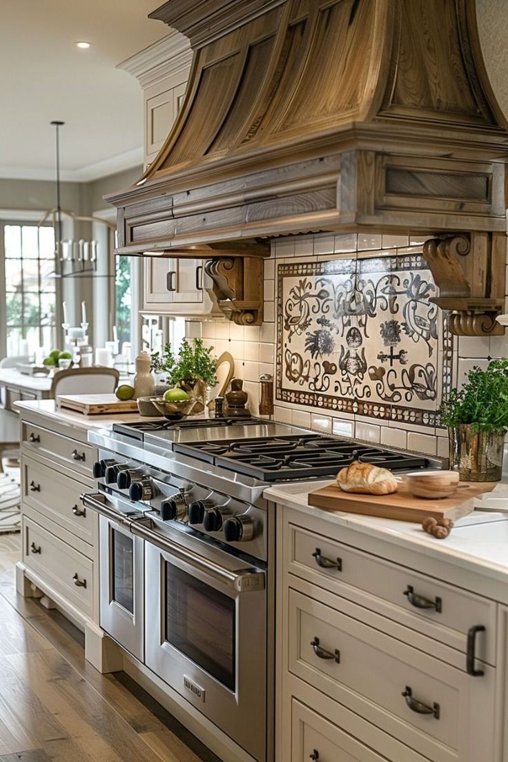 a kitchen with an oven, stove and counter tops in the middle of the room