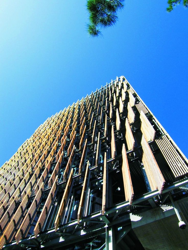 looking up at the side of a tall building