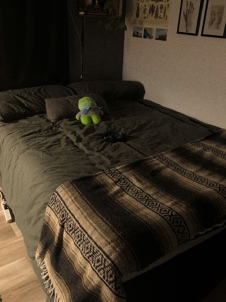 there is a stuffed animal on the bed