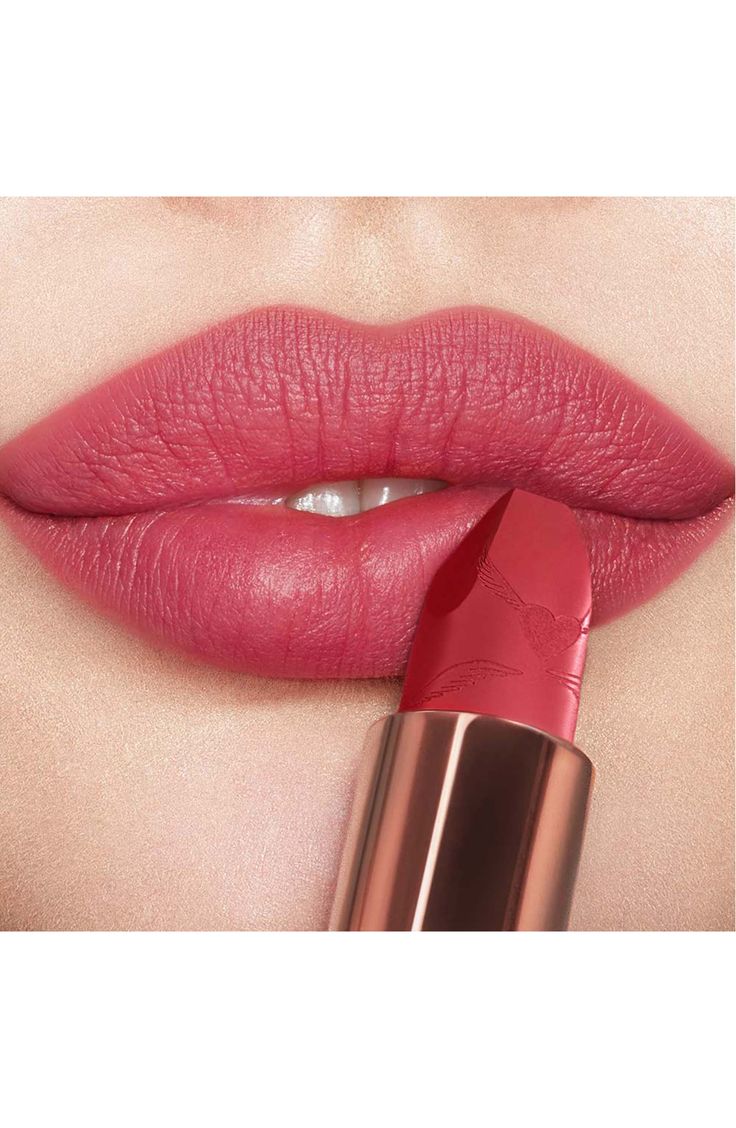 What it is: A rosebud-pink matte-finish lipstick with a long-lasting, buildable, hydrating formula.What it does: These dreamy, nuanced, rosebud shades help you look like the most beautiful version of you. The lipstick features 3D glow pigments that help lips appear wider and fuller, and its matte formula is enriched with Charlotte's secret ingredient and orchid extract to protect and soothe, delivering a cashmere-like finish. Its unique square-angled tip mimics the shape of a lip brush for preci Rosy Pink Lipstick, Rosy Lipstick, Peachy Lipstick, Charlotte Tilbury Looks, Perfect Lipstick Shade, Charlotte Tilbury Matte Revolution, The Look Of Love, Rose Makeup, Look Of Love