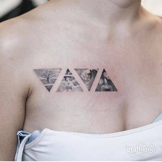 a woman with a tattoo on her chest has three triangles in the shape of trees