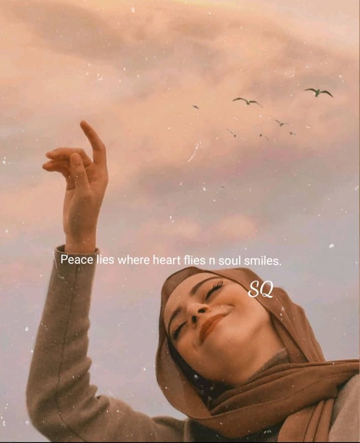 a woman with her hand up in the air and birds flying above her, saying peace is where hearts are each smiles