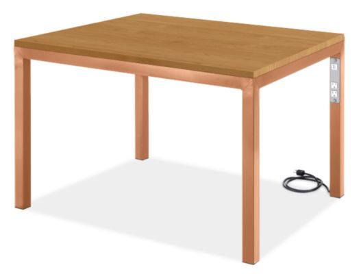 a wooden table with an electric outlet plugged into it