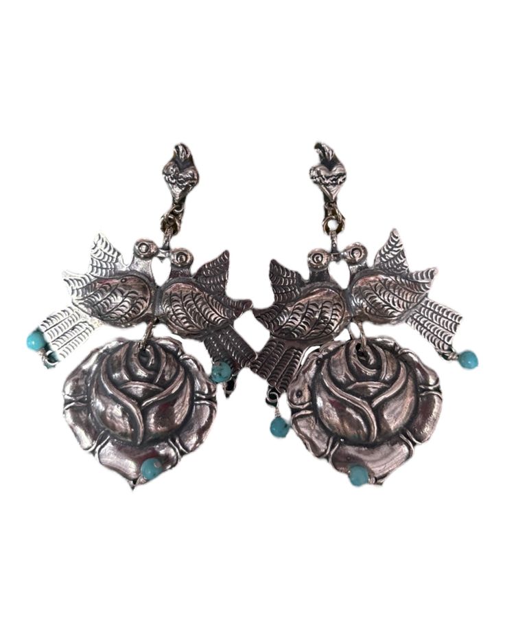 Get ready to bloom with our Adriana Earrings! These adorable rose earrings are made of high-quality German silver, adding a touch of elegance to any outfit. Perfect for any occasion, and sure to make you stand out! Concho Belt, Wild Rag, German Silver, Fine Earrings, Rose Earrings, Bronze Color, Silver Color, Baby Shoes, Accessories Hats