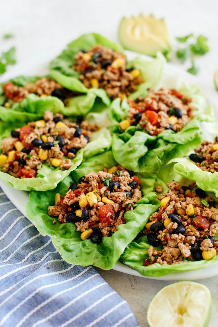 lettuce wraps filled with ground beef, black beans, corn and cilantro