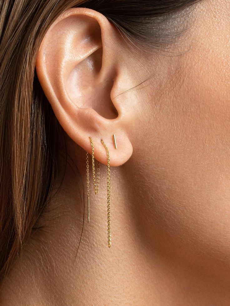 "These stunning Hanging Bar Earrings feature a unique threader design that effortlessly dangles from your earlobes, creating a striking, eye-catching look. Made with high-quality materials, these Threader Earrings are fashionable and durable. Whether it's a special occasion or a casual day out, these earrings are an impeccable accessory that will add a touch of sophistication to any outfit. With their sleek and contemporary design, these versatile earrings make a perfect Jewelry Gift for Her. So Bar Threader Earrings, Dainty Threader Earrings, Minimalist Linear Dangle Earrings With Adjustable Chain, Minimalist Delicate Chain Threader Drop Earrings, Minimalist Delicate Chain Threader Earrings, Minimalist Dangle Earrings With Delicate Chain, Minimalist Threader Drop Earrings With Adjustable Chain, Minimalist Dangle Threader Earrings With Cable Chain, Delicate Pierced Threader Earrings For Everyday