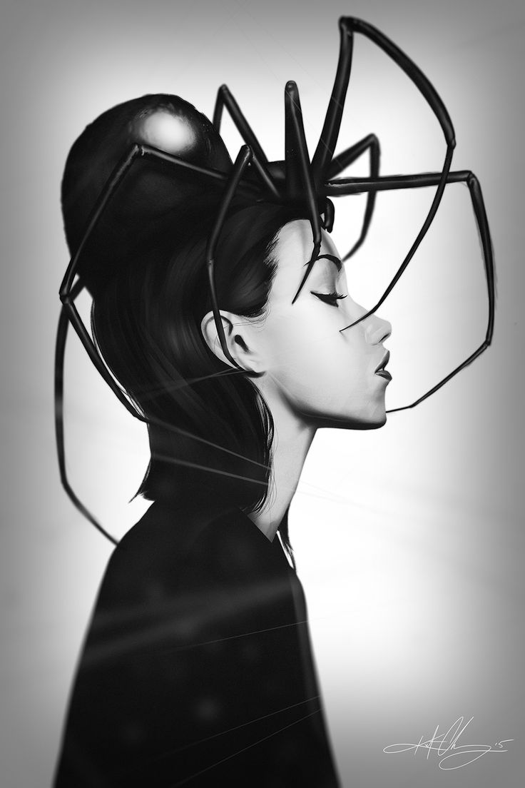 a black and white photo of a woman wearing a spider mask