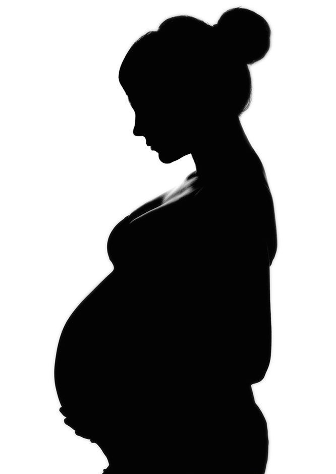 a pregnant woman silhouetted against a white background