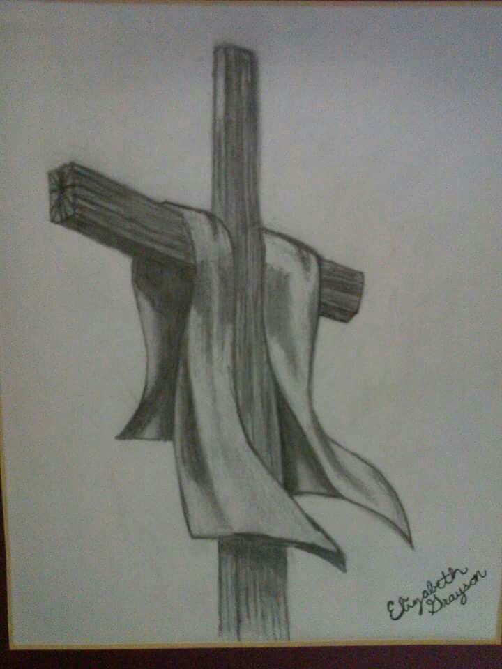 a drawing of a cross with a cloth draped around it