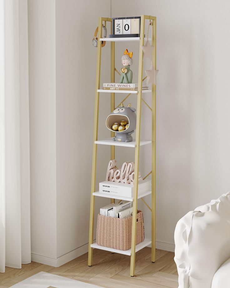 a white and gold shelf with books on it next to a bed in a room