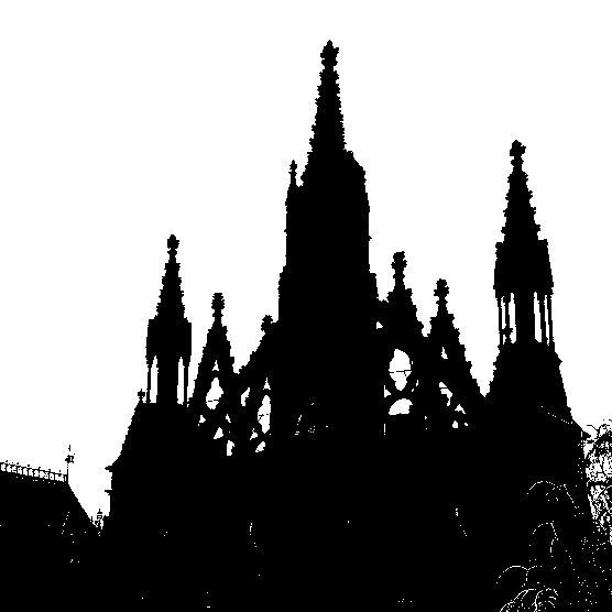 the silhouette of an ornate building against a white sky