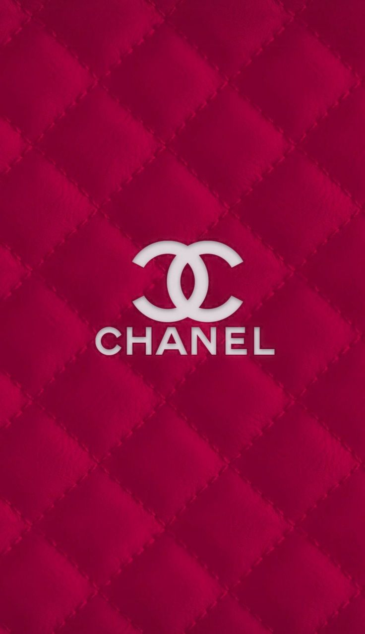 the chanel logo is displayed on a red quilted fabric wallpaper with white letters