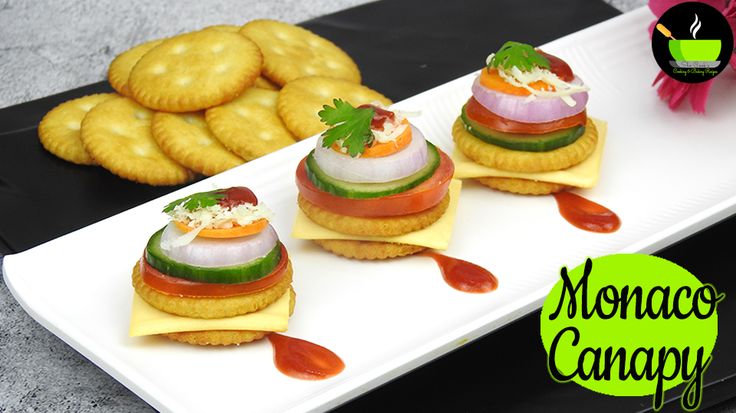 three appetizers are arranged on a plate with crackers