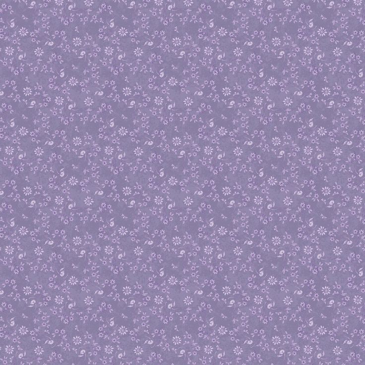 a purple background with small white flowers on it