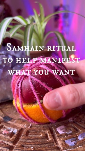 someone is holding an orange in their hand with the caption saying, samhai ritual to help manfest what you want