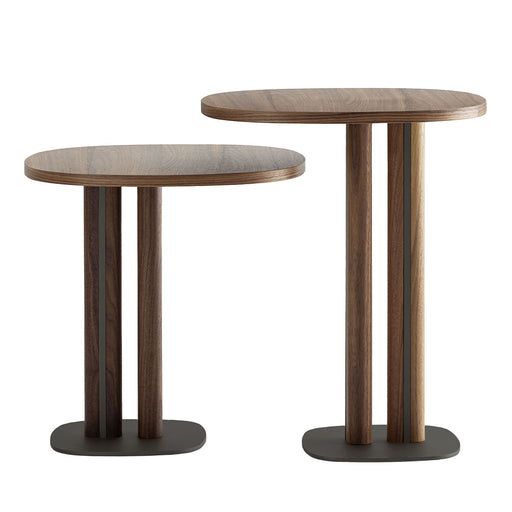 two wooden tables sitting next to each other