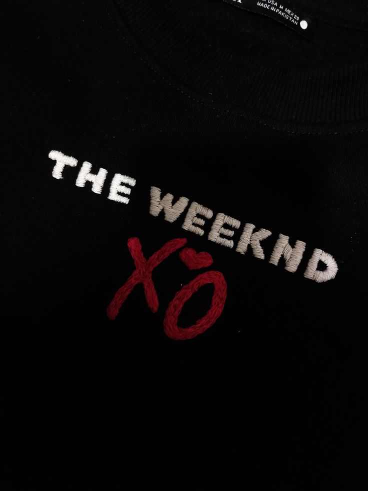 the weeknd xo t - shirt in black with red and white print on it