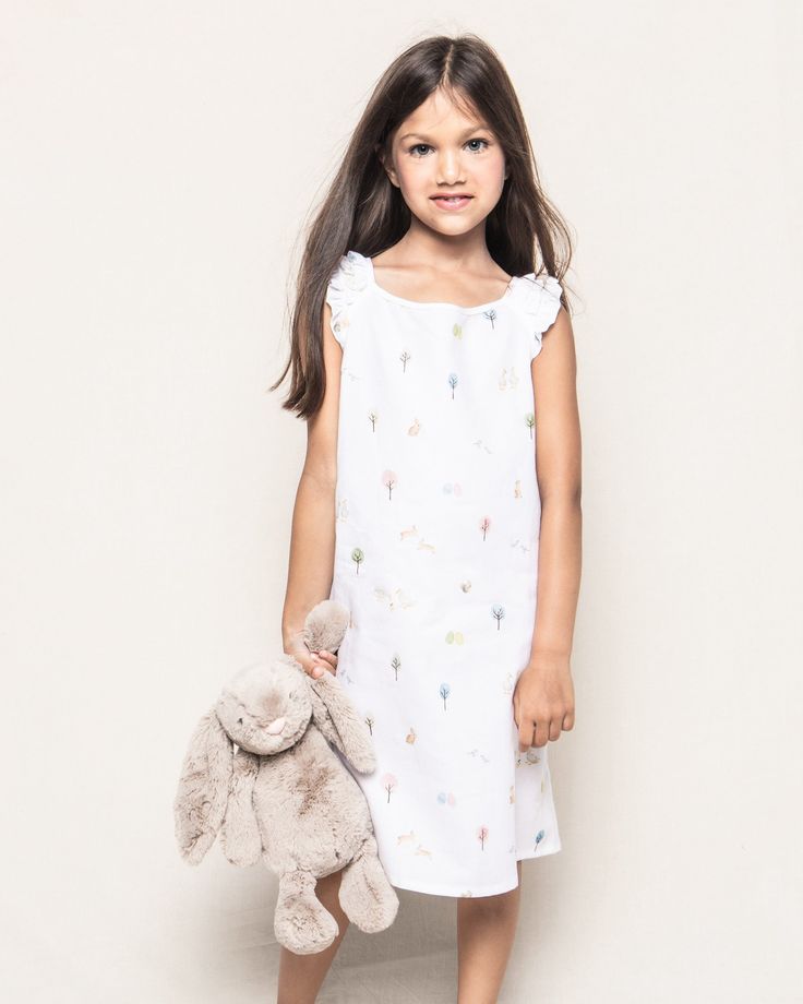 With a nod to Beatrix Potter’s English country charm, our Easter Gardens print features leaping bunnies, fluffy-tailed squirrels, fowl near blooming arbors, and painted eggs that suggest the magic inherent in spring. This nightgown will have you wrapped in comfort and will make every good night’s sleep that much better. The sleepwear is made from the finest quality cotton and blended with just enough inherently flame retardant fiber to allow it to pass strict CPSC flame retardant laws without us Leaping Bunny, Girls Nightgown, Luxury Sleepwear, Easter Garden, Country Charm, Garden Print, Shoe Size Conversion, Beatrix Potter, Shoe Size Chart