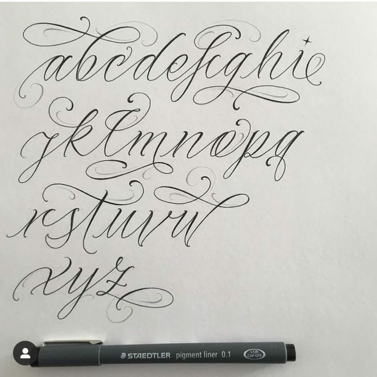 some type of calligraphy that is written in black ink on white paper with a pen