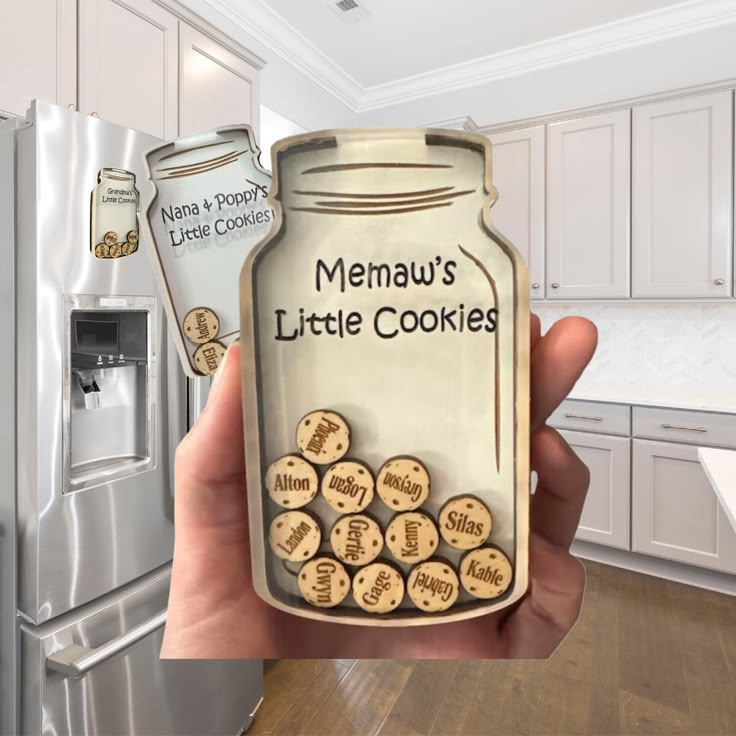 a person holding up a cookie jar in front of a refrigerator with magnets on it