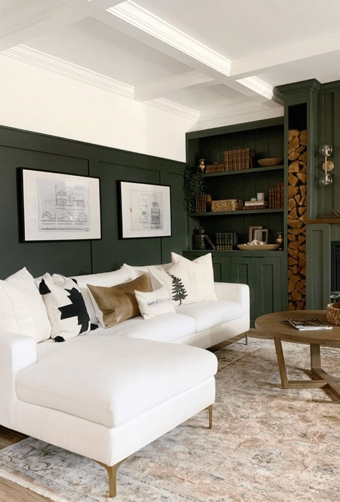 a living room filled with furniture and a fire place next to a book shelf full of books