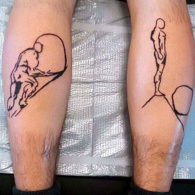 two men with matching tattoos on their legs