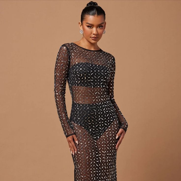 Black Mesh Sequin Dress Black Bodycon Maxi Dress For Party Season, Black Long Sleeve Maxi Dress With Sequins, Black Maxi Bodycon Dress For Party Season, Black Fitted Mesh Party Dress, Black Fitted Mesh Dress For Party, Black Mesh Maxi Dress For Party, Black Sequin Long Sleeve Bodycon Dress, Chic Black Mesh Club Dress, Black Long Sleeve Sequined Bodycon Dress