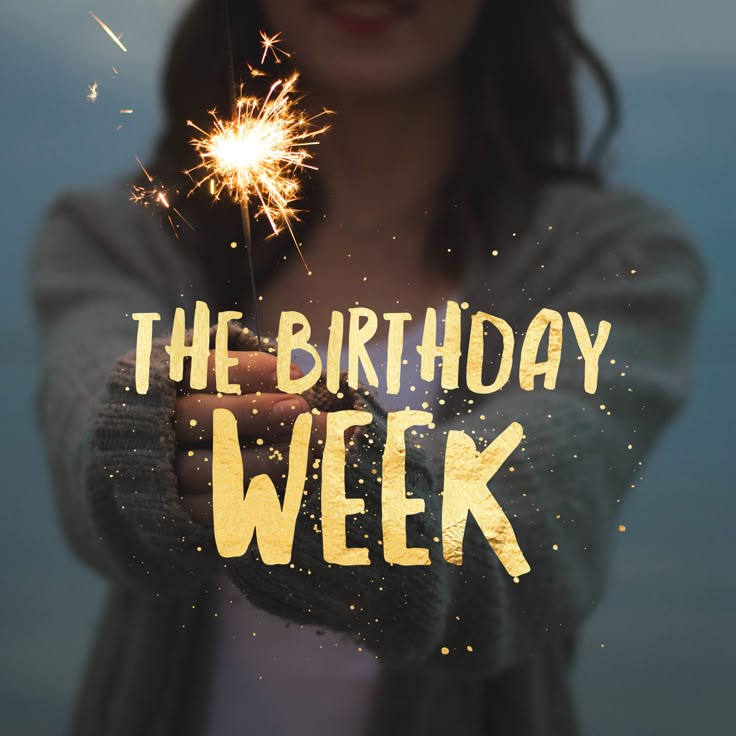 a woman holding a sparkler in her hand with the words the birthday week written on it