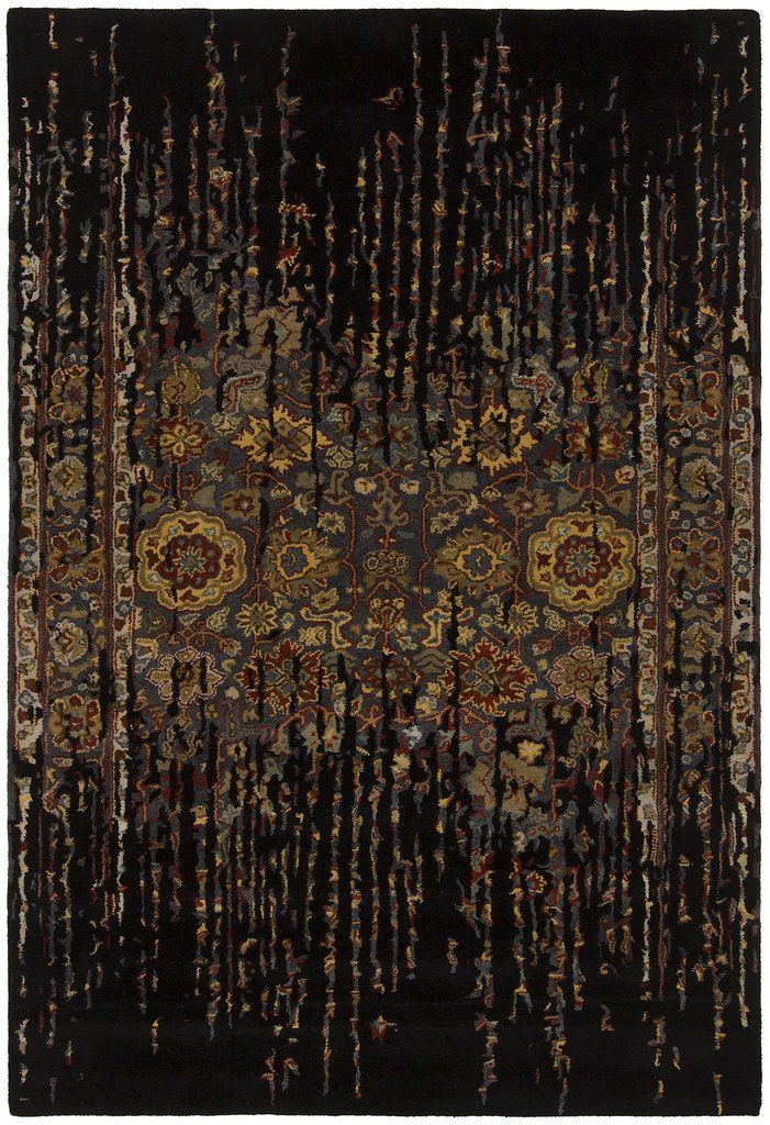 an area rug with many different colors and patterns