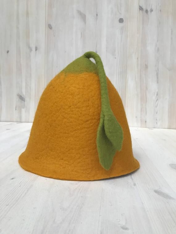 Felted sauna hat from 100% fine merino wool. Handmade.If you have a specially wish, please, contact with me!Sizes: S- 54/55 cm;  M-56/57; L-58/59; XL- 60/62; XXL-62/64Sauna hat protects your head and hair from overheating during sauna sessions. The head is most sensitive to sauna heat – you may feel dizzy, your hair can get excessively dry and brittle, the capillaries in your skin open up and may even break. All of this can make bathing in sauna a less pleasant experience. However, when your hea Adjustable Wool Felt Hat For Fall, Orange Wide Brim Hat For Winter, Orange Short Brim Hat, One Size Fits Most, Orange Brimmed Hat For Fall, Winter Orange Hat With Short Brim, Orange Hat With Short Brim, One Size Fits Most, Handmade Orange Wide Brim Hat, Orange Wide Brim Winter Hat, Handmade Orange Hats With Curved Brim