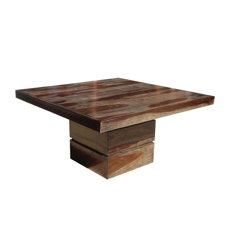 a square wooden table sitting on top of a white floor