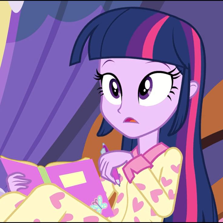 the pony is reading a book while wearing a pink and blue dress with hearts on it