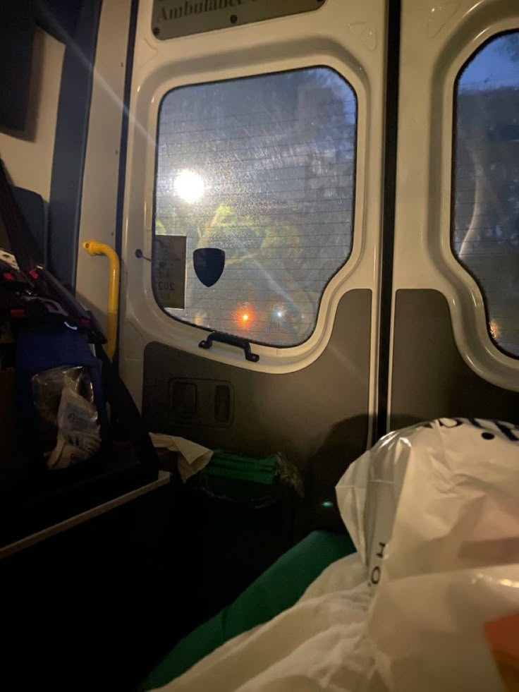 the inside of a train with two windows