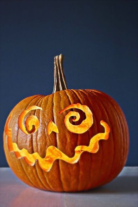 a carved pumpkin sitting on top of a table