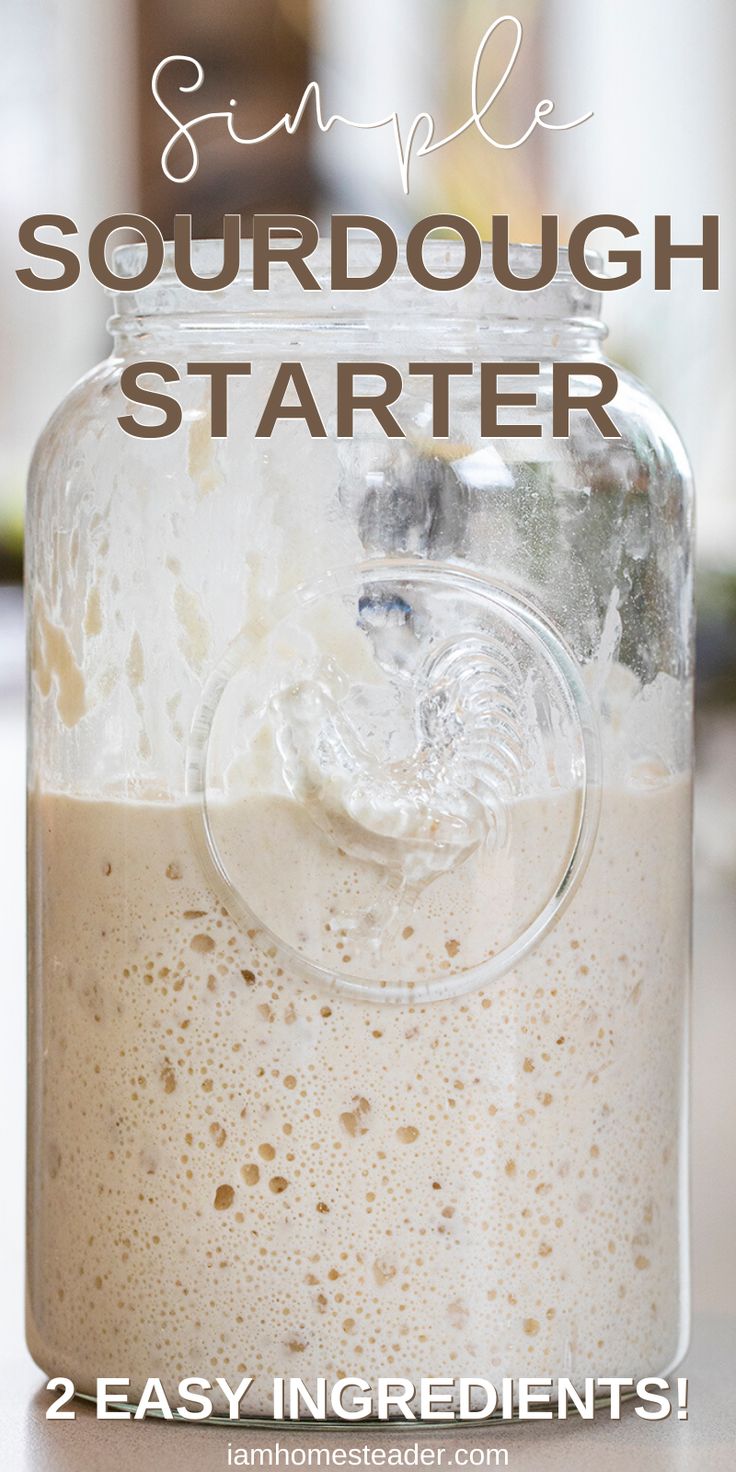 a mason jar filled with sourdough sitting on top of a table