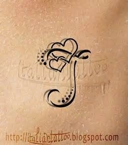 a tattoo with the letter j on it