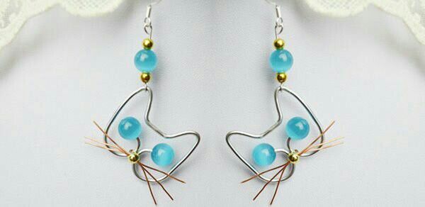 the earrings are made with wire and glass beads