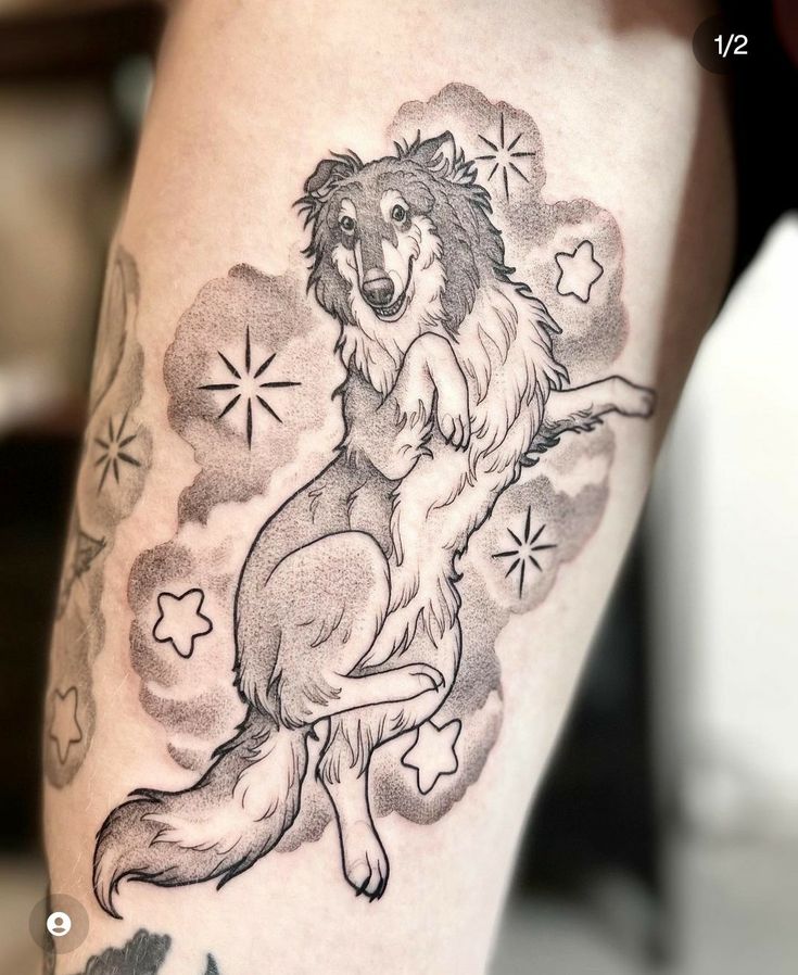 a black and white photo of a wolf tattoo on the leg, with stars in the background