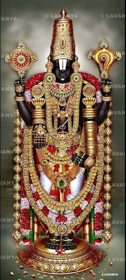 the statue of lord ganesha in gold and red colors with two hands on his chest