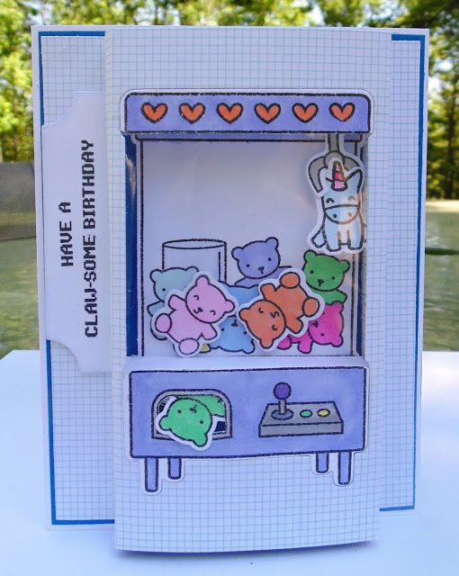 an open card with teddy bears in a toy machine on it's front and back sides