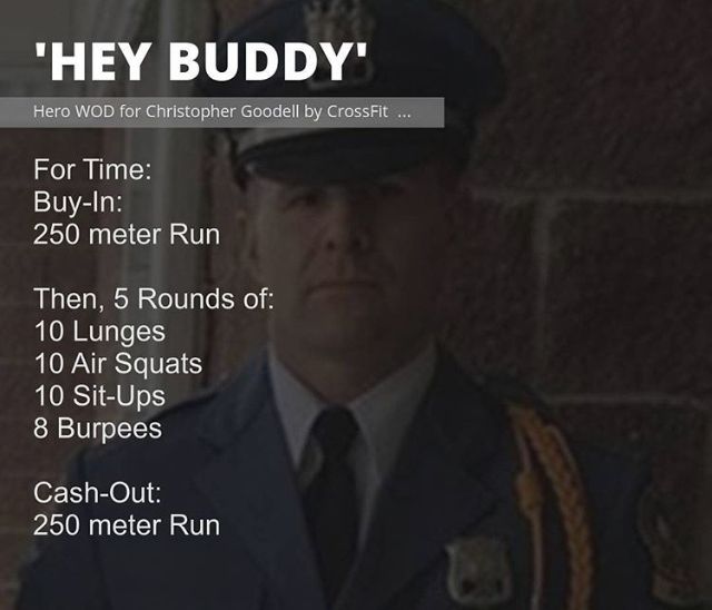 a man in uniform standing next to a brick wall with the words hey buddy on it