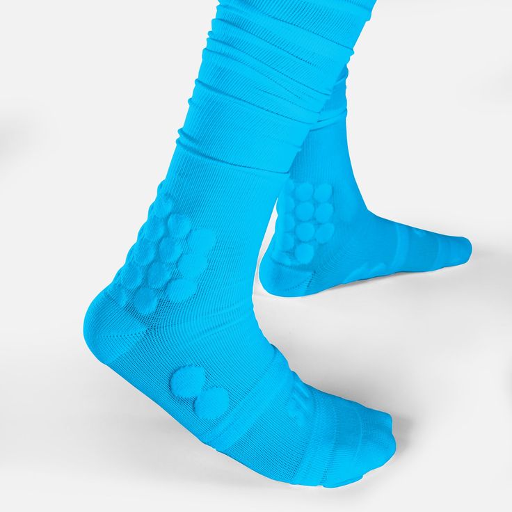 Choose padded socks designed to protect your feet and legs for the long haul with your completing tryouts or in a game. The best padded socks from SLEEFS will provide complete support to your feet with extra padding, designed to protect sensitive areas like your ankles. With padded football socks, it is less likely that you will sustain a significant injury during a fall. These padded running socks are also designed to keep levels of moisture under control. Stop sweat or water soaking your feet with sports gear made from moisture wicking material. The nylon/spandex blend will guarantee that your feet will stay dry for the duration of a game. This added level of comfort will ensure you can focus on reaching your maximum potential. Padded ankle socks from SLEEFs are suitable for a wide range Blue Sports Socks, Blue Non-slip Sporty Socks, Sporty Non-slip Blue Socks, Breathable Knee-high Socks For Training, Blue Stretch Sporty Socks, Sporty Stretch Blue Socks, Breathable Compression Knee-high Socks For Sports, Sporty Blue Stretch Socks, Comfortable Stretch Blue Socks