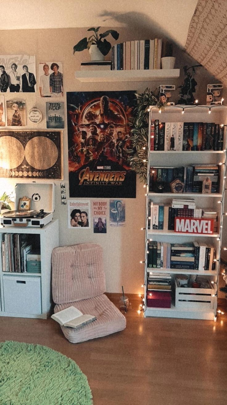 a living room filled with furniture and bookshelves next to a wall mounted movie poster