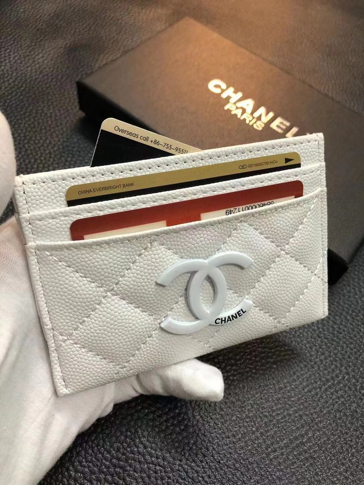 Discover the epitome of sophistication with the Luxury Chanel Classic Wallet Card Holder. Crafted with iconic design and superior craftsmanship, this accessory blends timeless style with practicality. Elevate your ensemble with Chanel's signature quilted pattern and impeccable luxury. Bags Classy, Croc Ideas, Chanel Iphone Case, College Needs, Signature Quilts, Branded Wallets, Pocket Books, Spa Design, Favorite Handbags