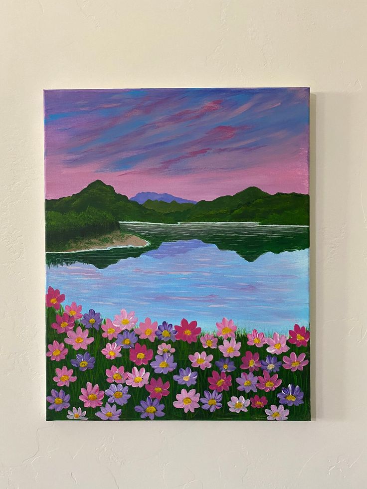 a painting on the wall of a lake with flowers in it and mountains in the background