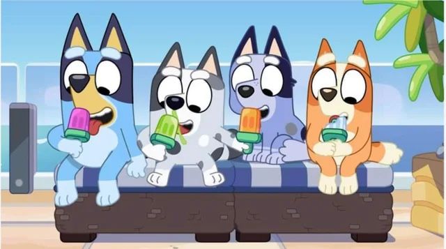 three cartoon dogs are sitting on a couch and one dog is eating an ice cream cone