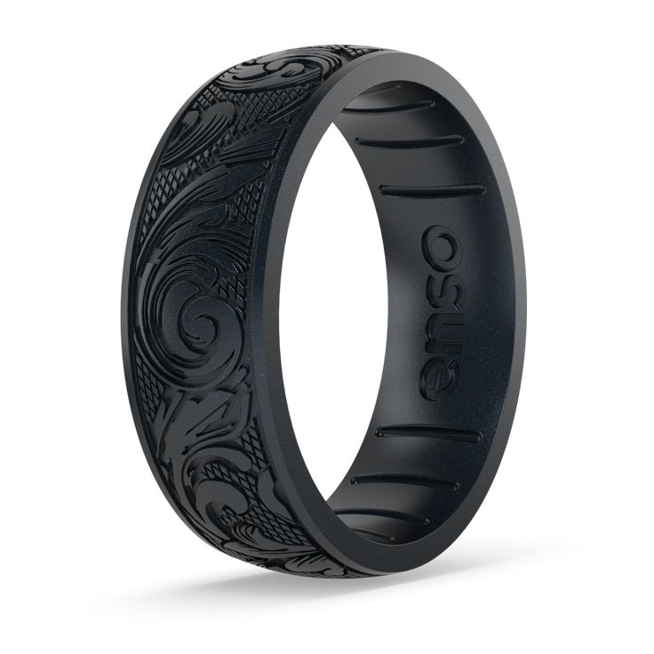 Experience elegance and flexibility with our intricately laser-engraved Flourish silicone ring in Black Pearl, a perfect blend of sophistication and functionality for any occasion. Made in the USA: Made with the highest quality materials to set the standard for luxury silicone rings Ultra Comfortable: Unique, flexible design for ultra comfort even with swelling fingers and hands Safe: Engineered with Anti Ring Avulsion Technology to break away and protect your finger Breathable Channels: Promotes airflow to keep your fingers dry and comfortable Dimensions:Width: 6.6mmThickness: 1.75mm | Enso Rings Etched Signature Silicone Ring | Flourish - Black Pearl | Size 5 Enso Rings, Silicone Ring, Wedding Engagement Rings, Silicone Rings, Flexible Design, Pearl Size, Black Pearl, Unique Wedding, Laser Engraved