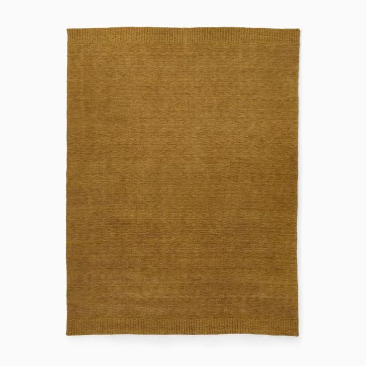 a brown rug on a white background with no one in it or someone out there