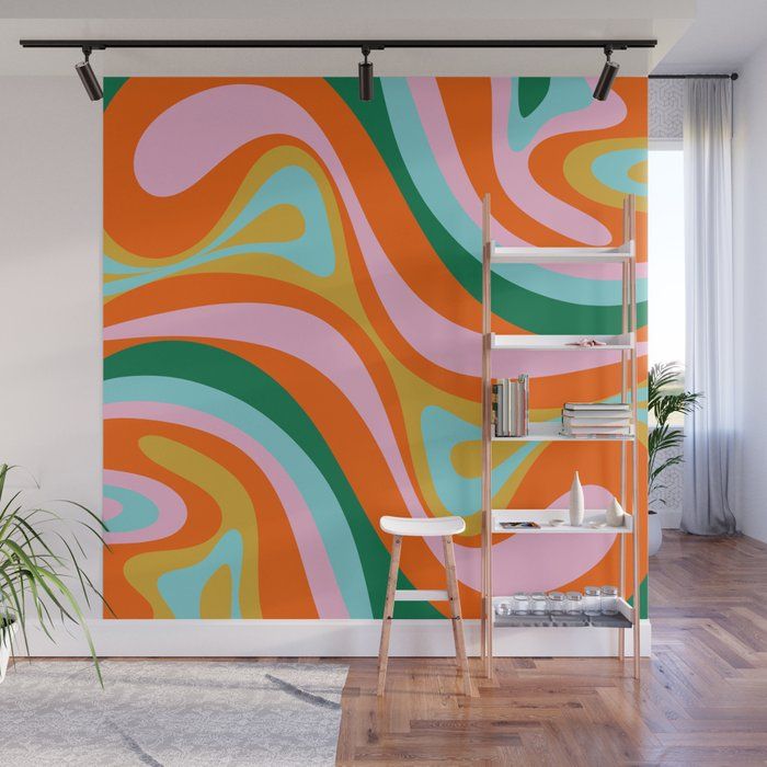 an orange, pink, and green swirl wall mural