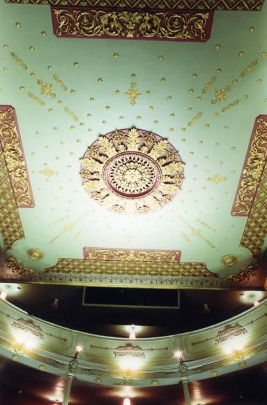 an overhead view of the ceiling in a theater